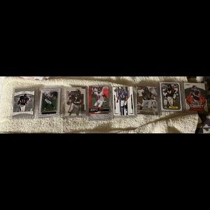 Football cards still in plastic Ray Lewis, rookie, Joe Flacco, Michael Vick, etc